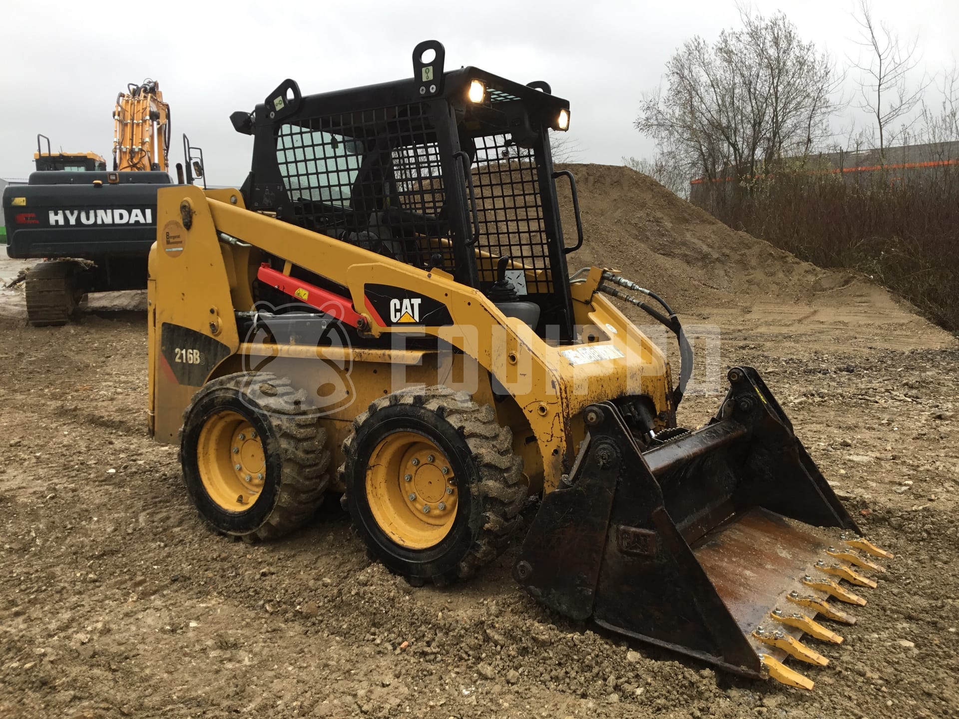 Caterpillar 216B3  - - Used Loader