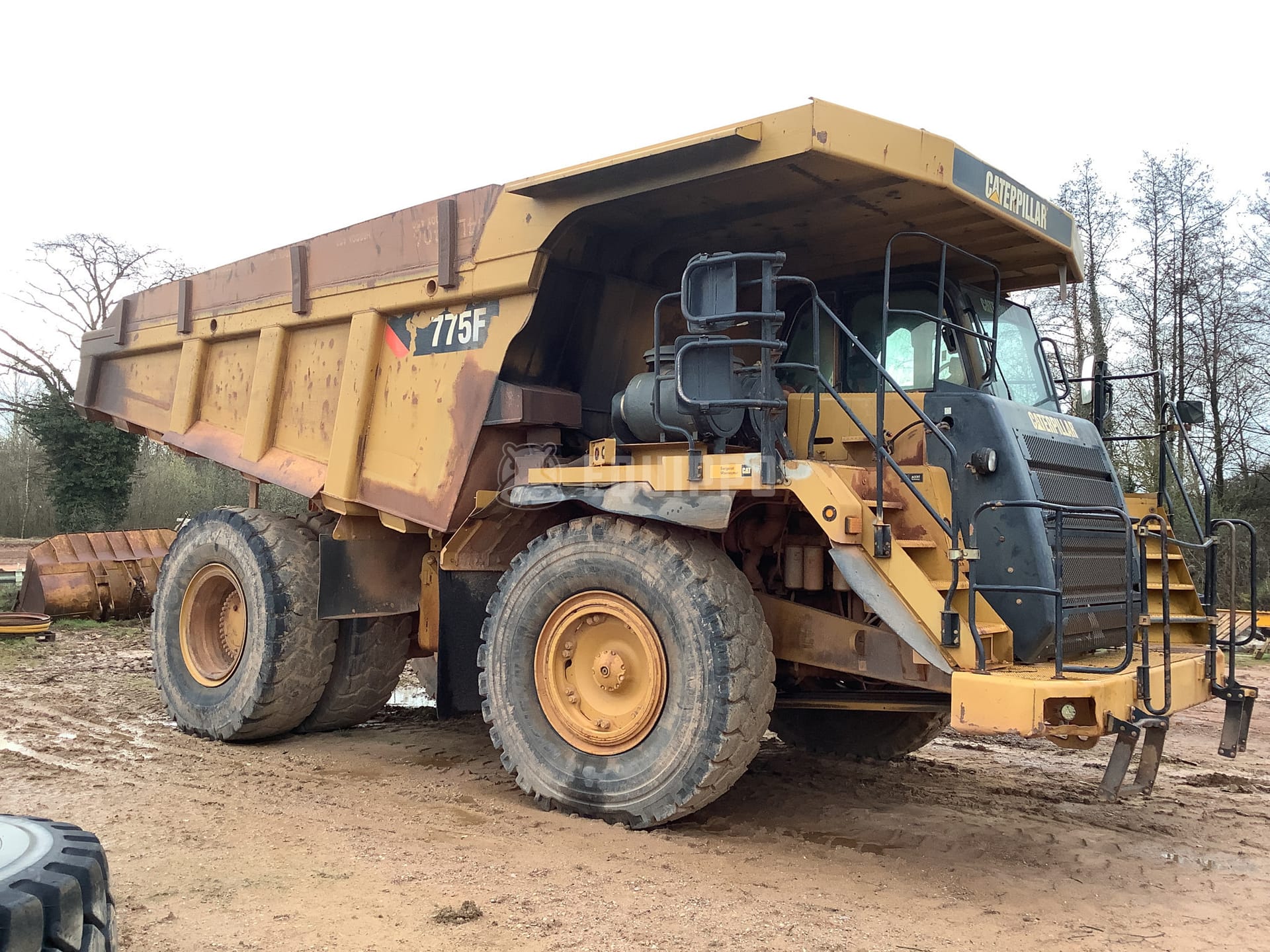 Caterpillar 775F - - Used Rigid Dump Truck
