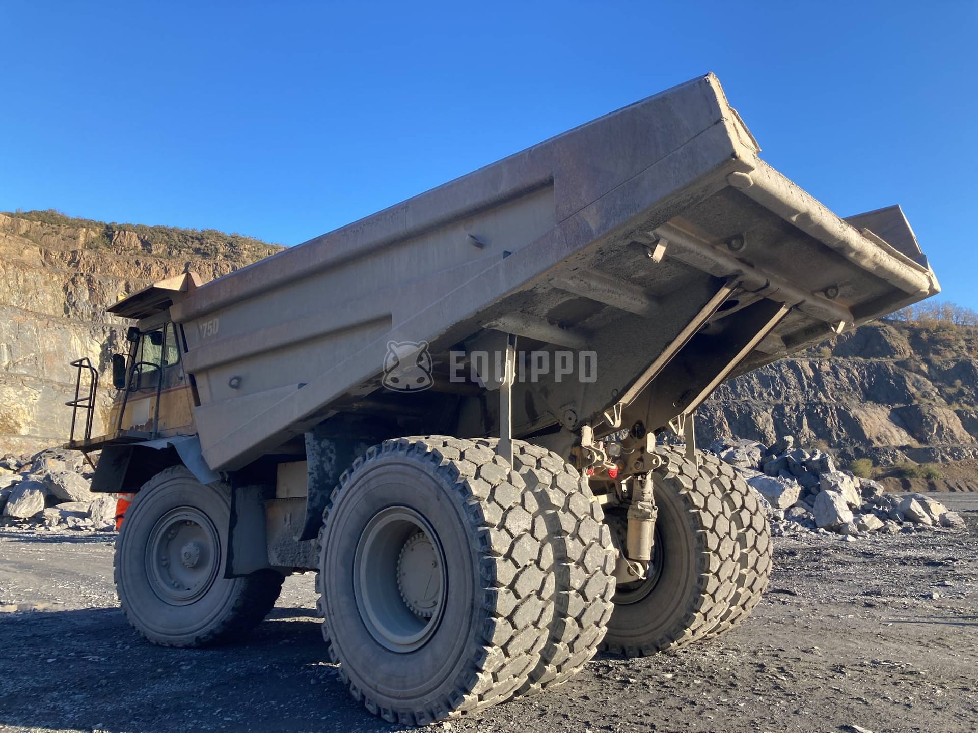 Caterpillar 775D  - - Used Rigid Dump Truck