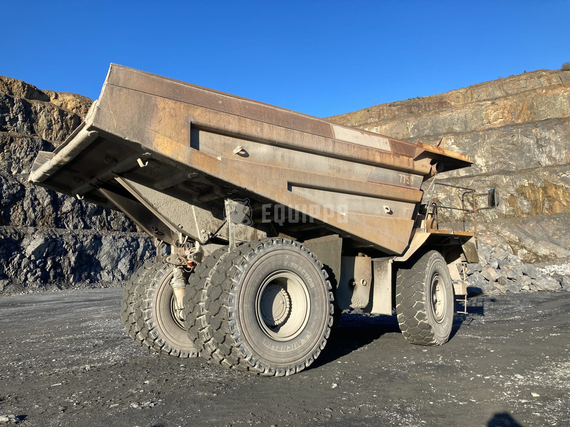 Caterpillar 775D  - - Used Rigid Dump Truck