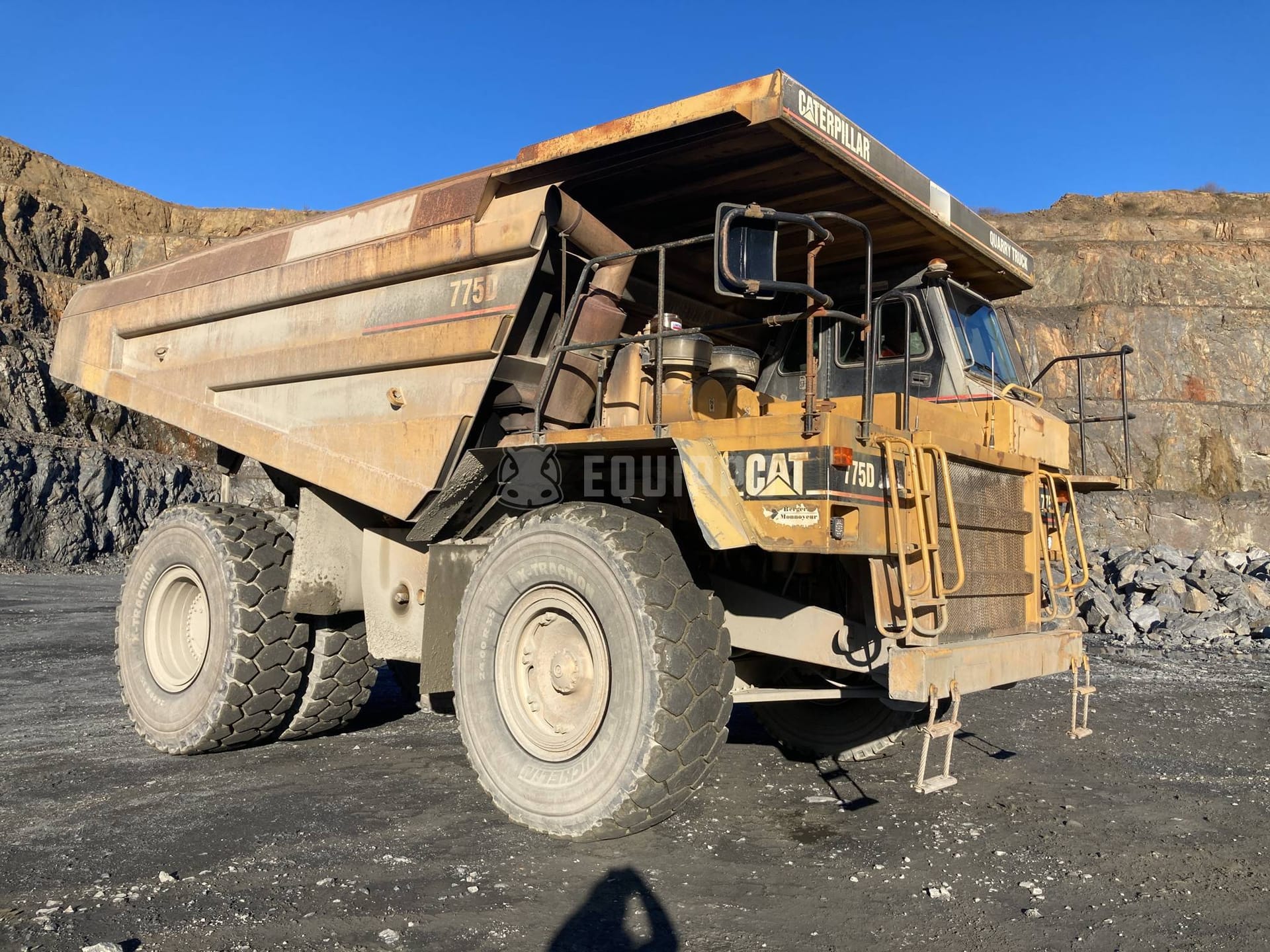 Caterpillar 775D  - - Used Rigid Dump Truck