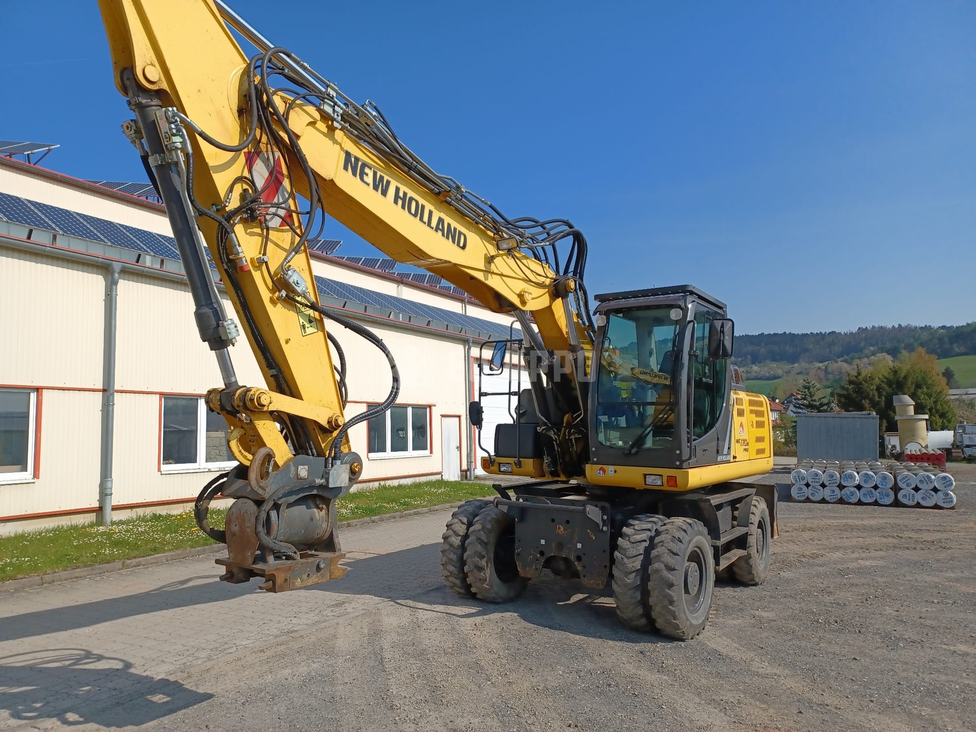 New Holland WE170B pro - OQ65 & HKS tilt rotator - - Used Wheeled Excavator