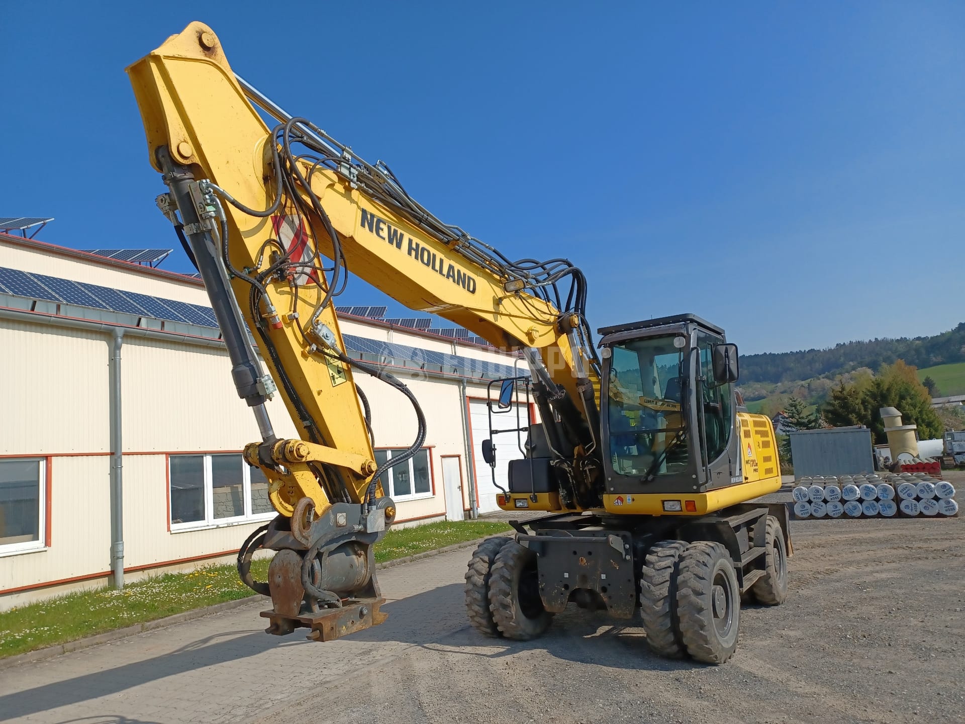 New Holland WE170B pro - OQ65 & HKS tilt rotator - - Used Wheeled Excavator