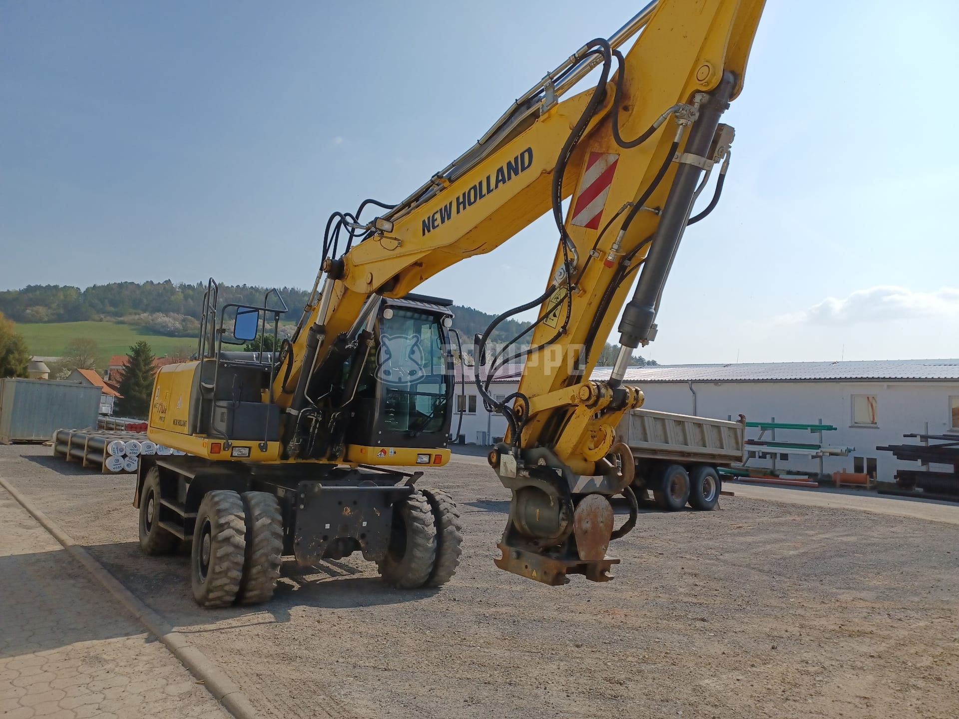 New Holland WE170B pro - OQ65 & HKS tilt rotator - - Used Wheeled Excavator