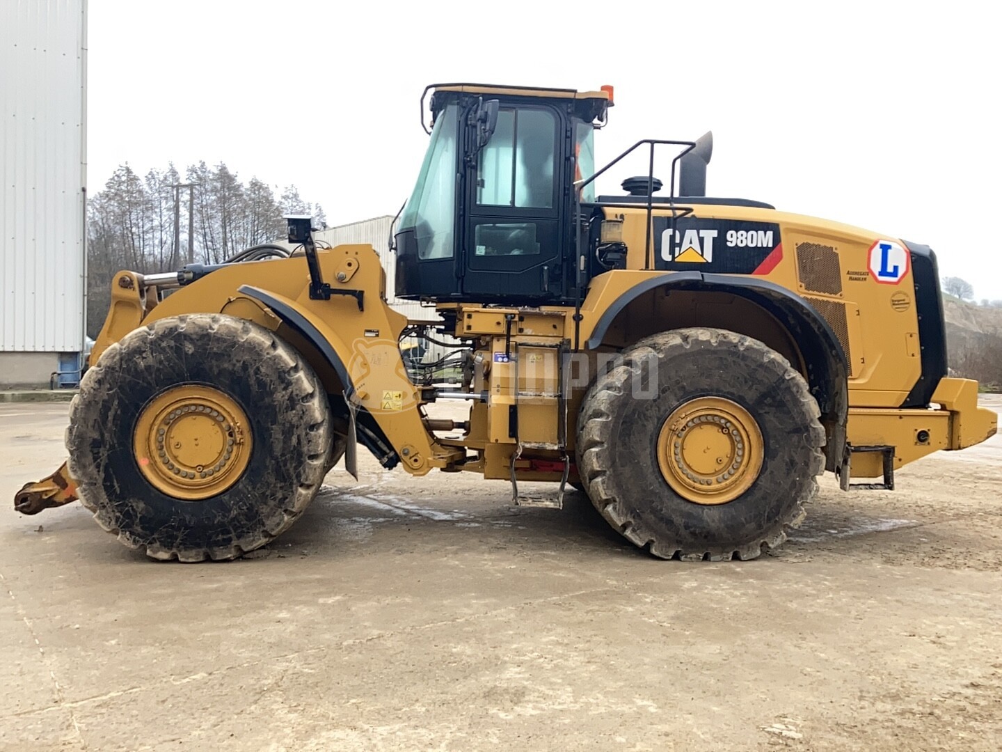 Caterpillar 980M (met emmer) - - Gebruikte Wiellader