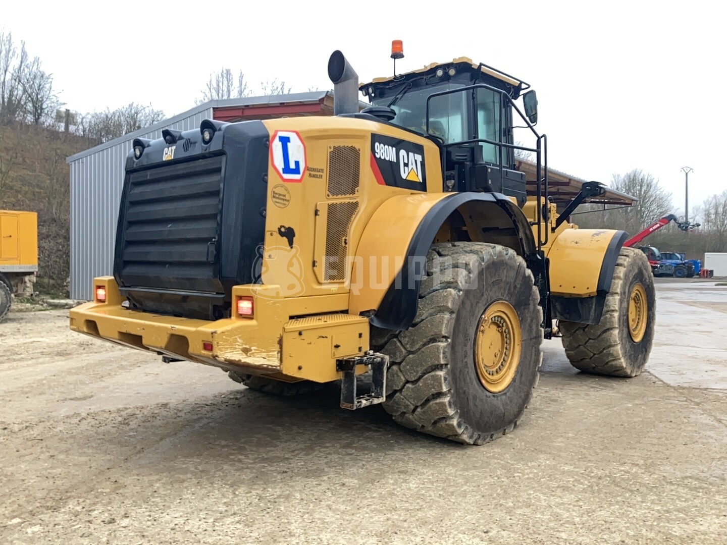 Caterpillar 980M (met emmer) - - Gebruikte Wiellader