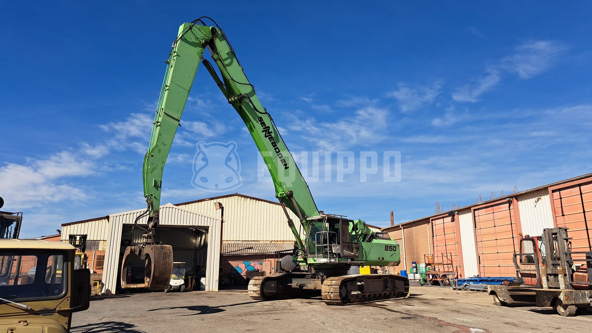 Sennebogen 850R avec grappin rotatif hydraulique - - Pelle de manutention d’Occasion