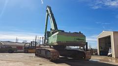 Sennebogen 850R con garra hidráulica rotativa - Left Back - Excavadora de Manutención Usada