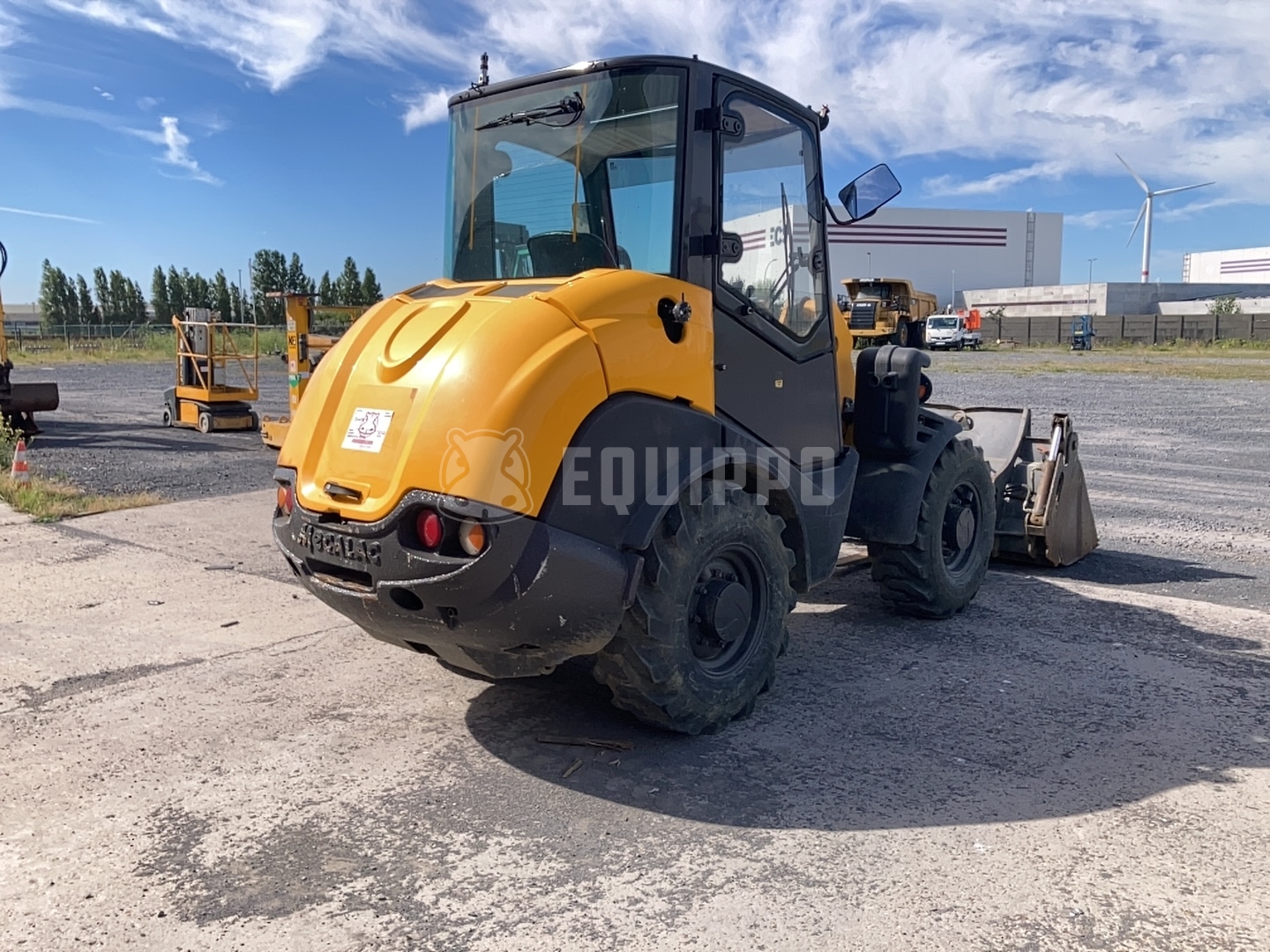 Mecalac AX700 with 4-in-1 bucket and forkboard - - Used Wheel Loader