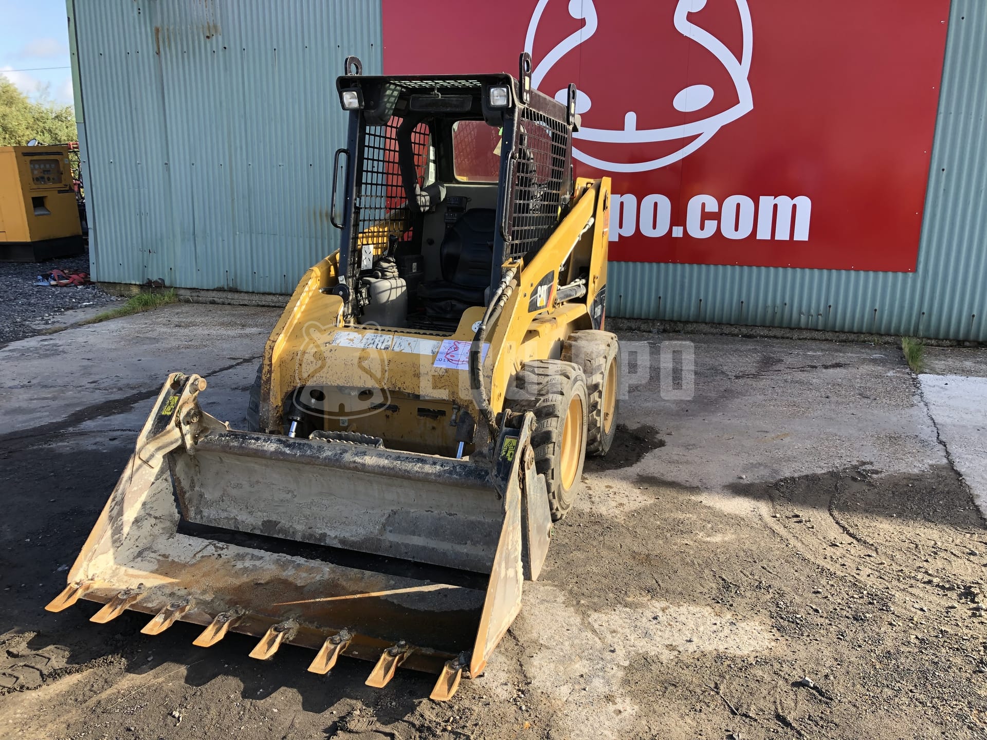 Caterpillar 216B3  - - Used Loader