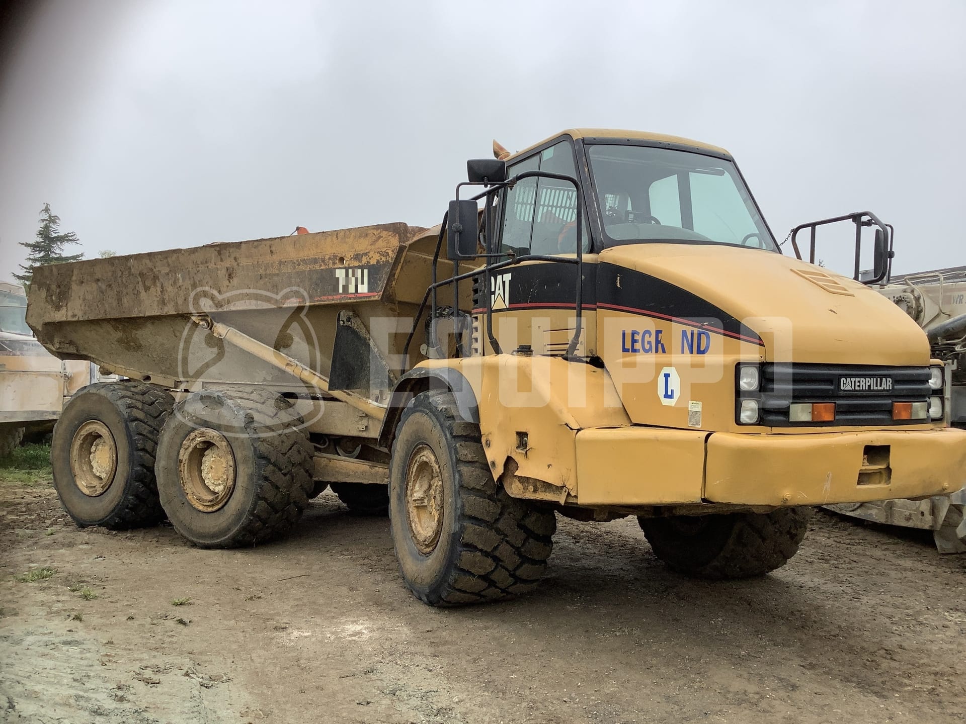 Caterpillar 725  - - Used Dump Truck