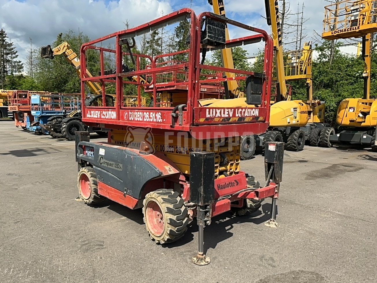 Haulotte Compact 12 Dx (12,06 meters) - - Used Scissor Lift