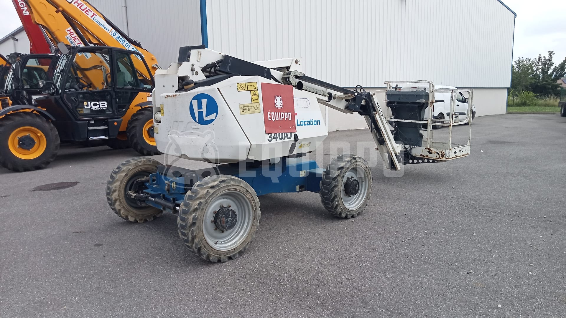 JLG 340AJ (12,31 mètres) - - Nacelle articulée d’Occasion