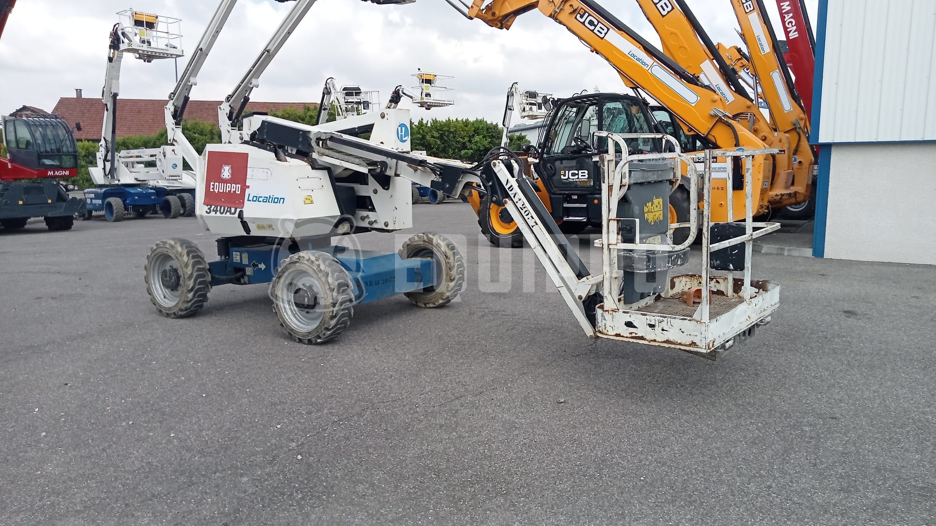 JLG 340AJ (12,31 mètres) - - Nacelle articulée d’Occasion