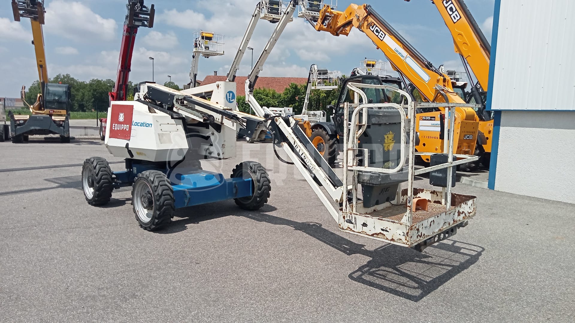 JLG 340AJ (12,31 mètres) - - Nacelle articulée d’Occasion