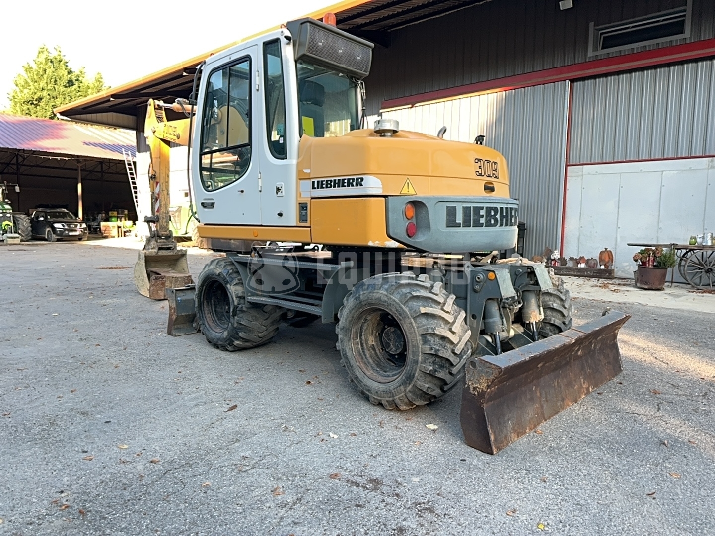 Liebherr A 309 Litronic with 2 buckets - - Used Wheeled Excavator