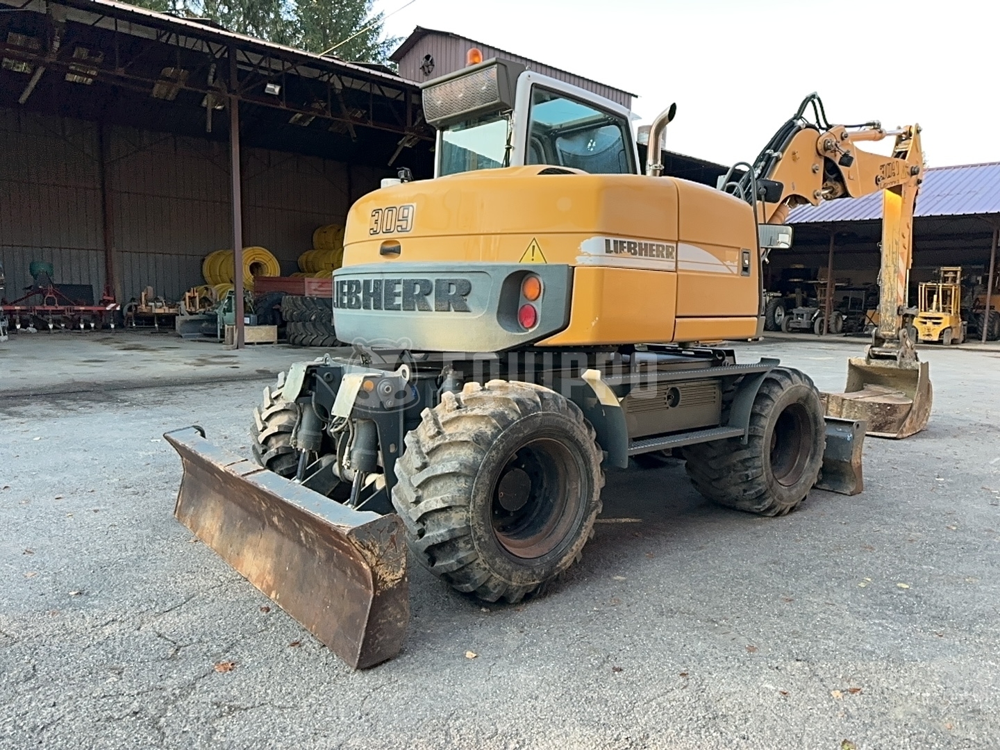 Liebherr A 309 Litronic with 2 buckets - - Used Wheeled Excavator