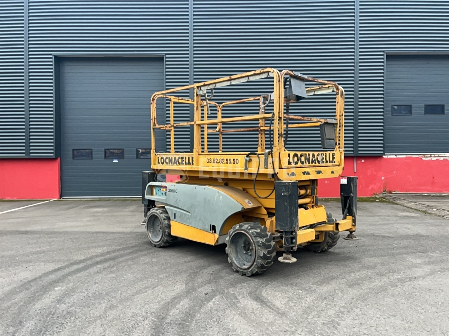 Haulotte Compact 10 (10m) - - Używany Podnośnik nożycowy