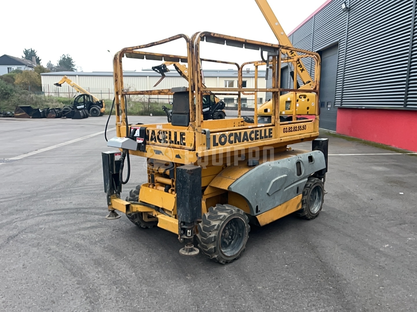 Haulotte Compact 10 (10m) - - Używany Podnośnik nożycowy