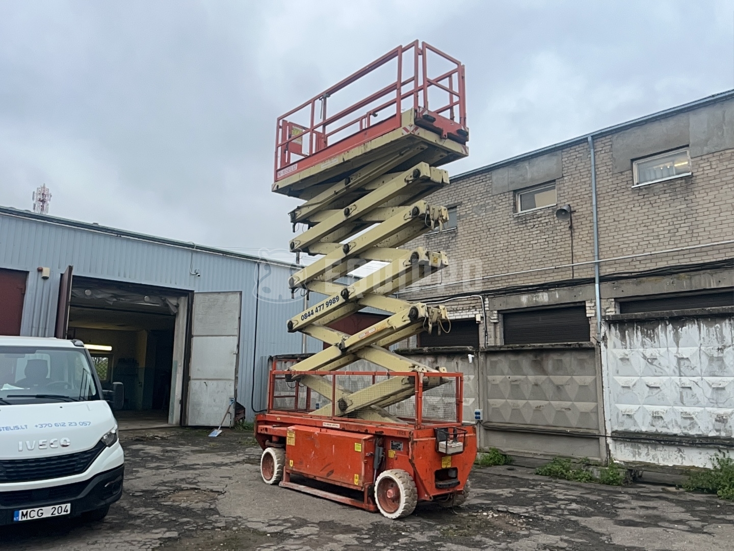 Holland-Lift N165-12EL 18.50 m - - Gebrauchte  Scherenhubtisch