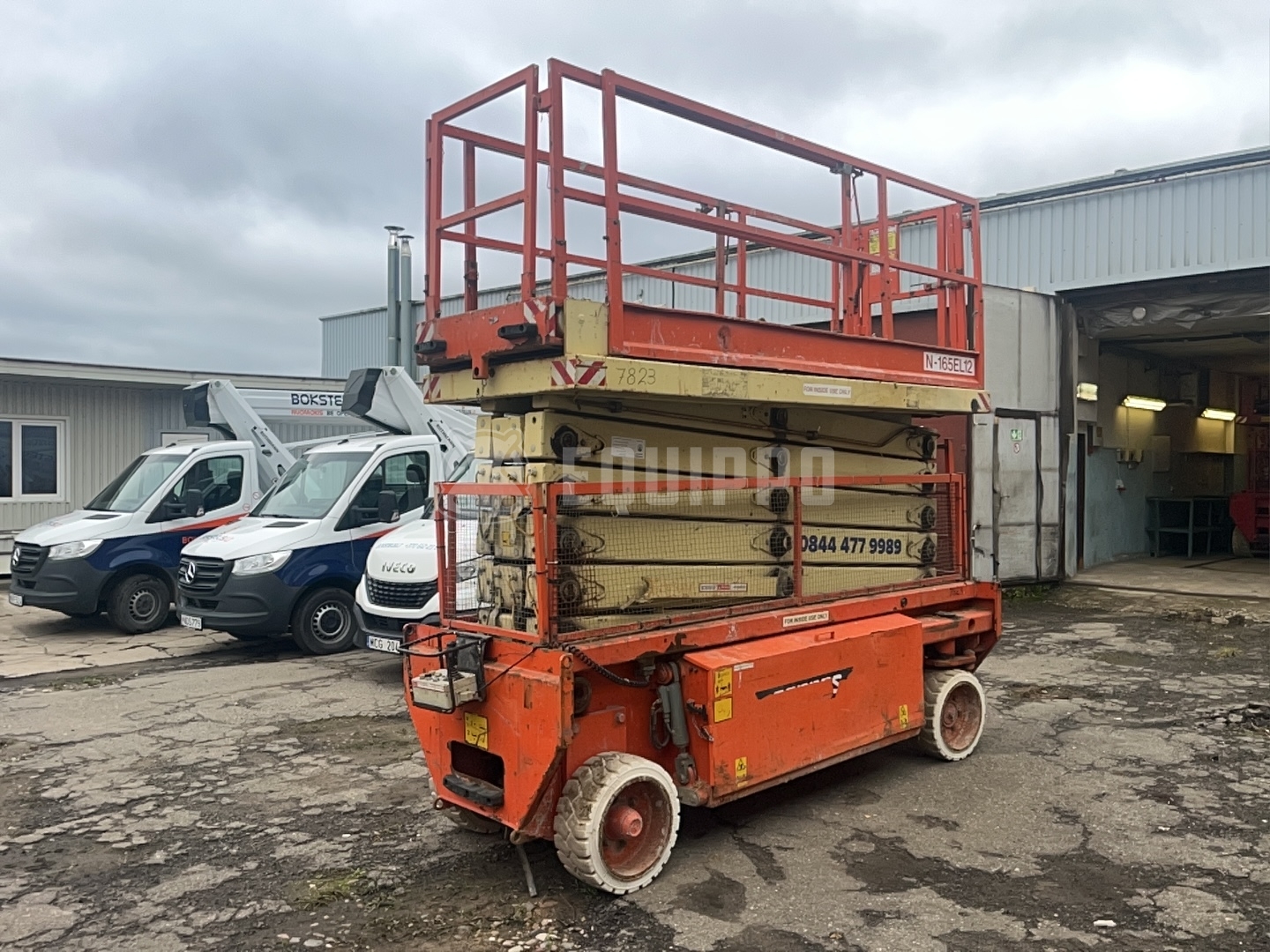 Holland-Lift N165-12EL 18.50 m - - Gebrauchte  Scherenhubtisch