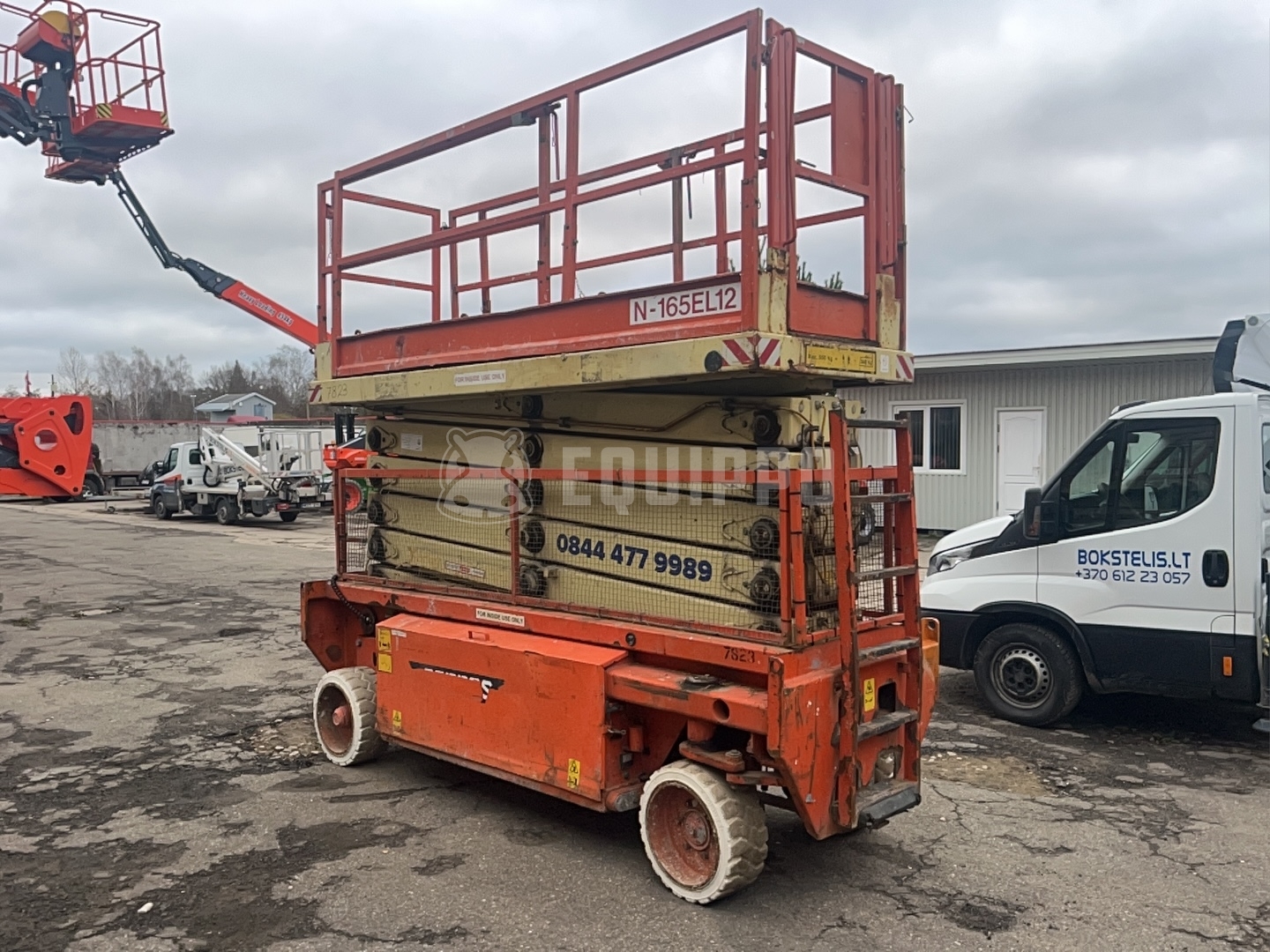 Holland-Lift N165-12EL 18.50 m - - Gebrauchte  Scherenhubtisch
