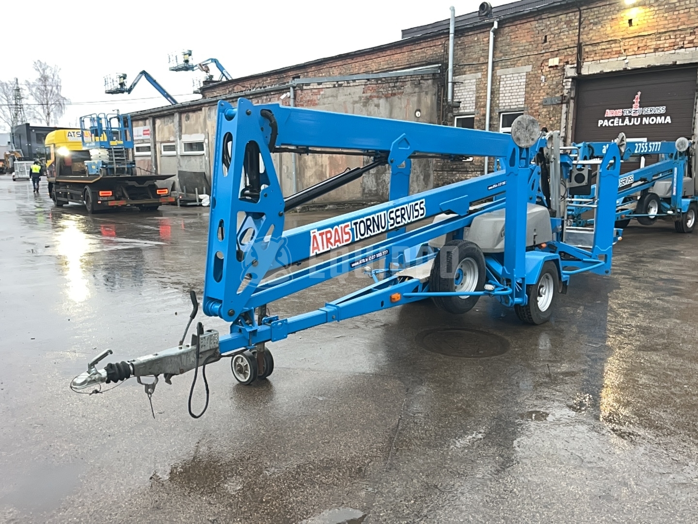 Genie TZ-50 Hybrid w/Drive (17m) - - Used Trailer-Mounted Boom Lift