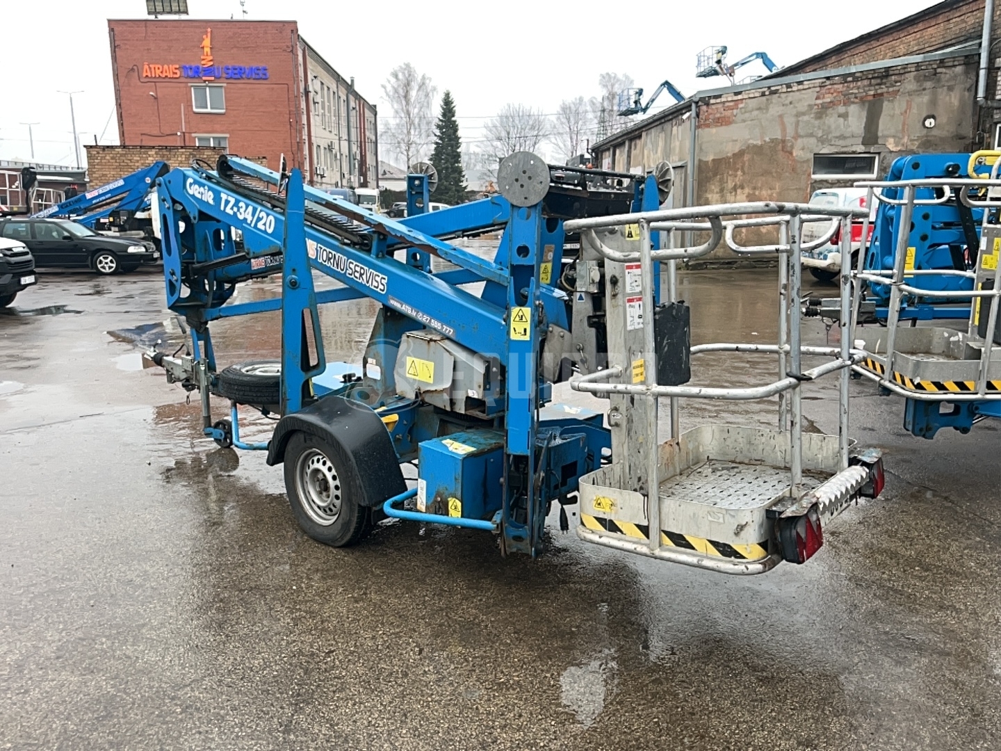 Genie TZ34 (12m) - - Gebruikte Trailer-Mounted Boom Lift