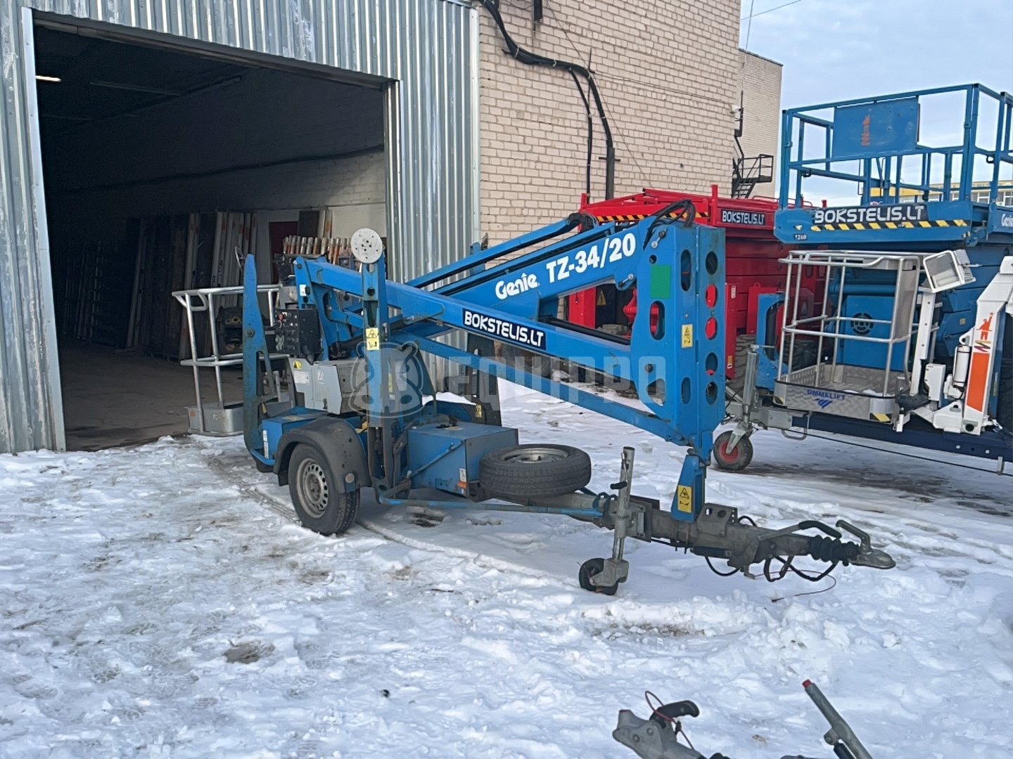 Genie TZ34 12.36 m - - Gebrauchte Trailer-Mounted Boom Lift