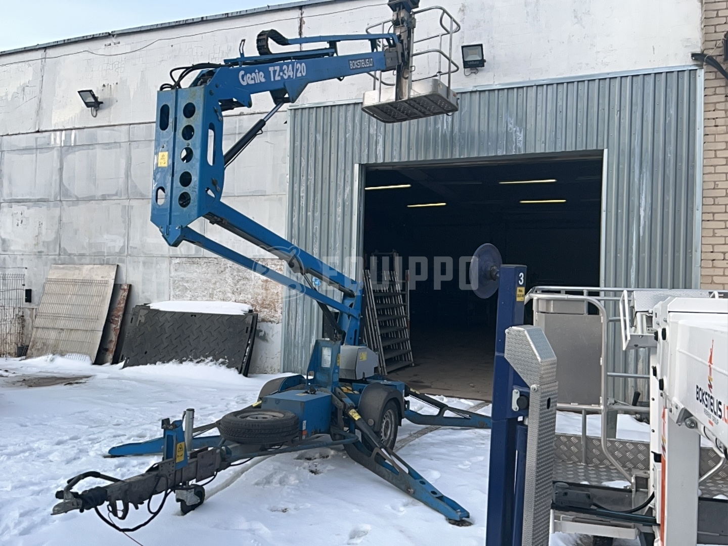 Genie TZ34 12.36 m - - Gebrauchte Trailer-Mounted Boom Lift