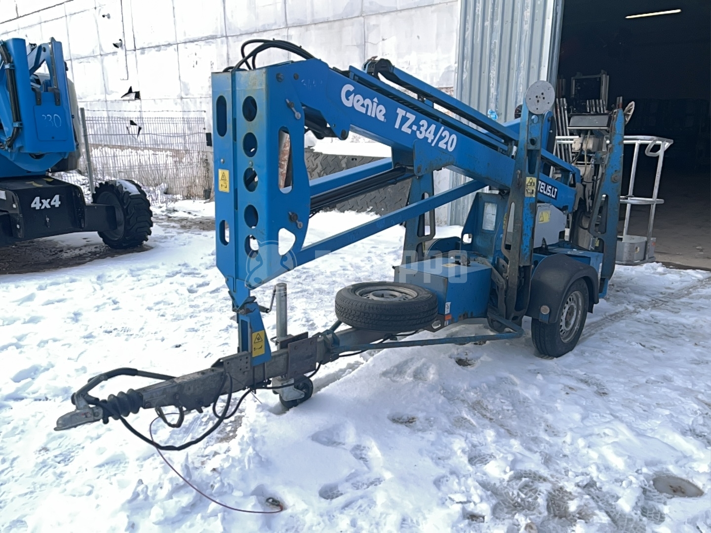 Genie TZ34 12.36 m - - Gebrauchte Trailer-Mounted Boom Lift