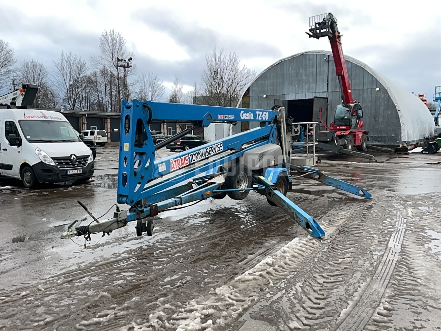 Genie TZ-50 DC w/Drive (17m) - - Used Trailer-Mounted Boom Lift