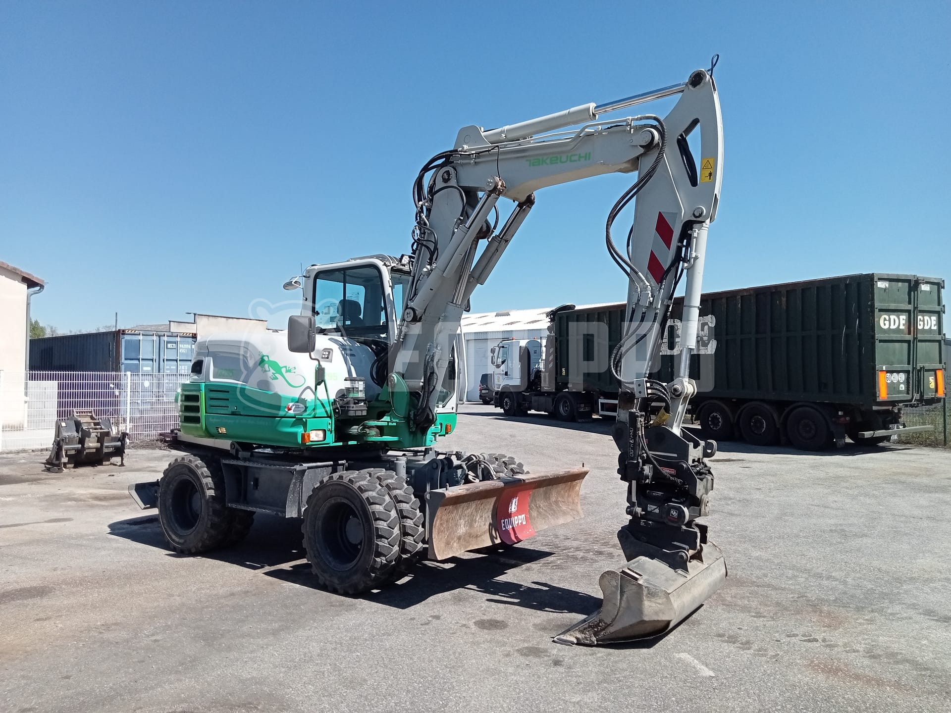 Takeuchi TB 295 W with Rototilt Oilquick, 3 buckets and forks - - Used Wheeled Excavator