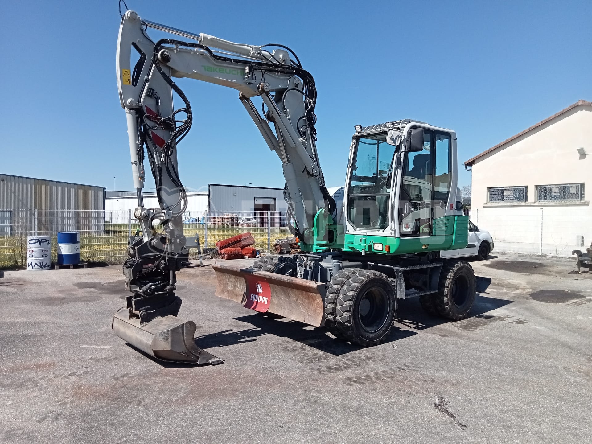 Takeuchi TB 295 W with Rototilt Oilquick, 3 buckets and forks - - Used Wheeled Excavator