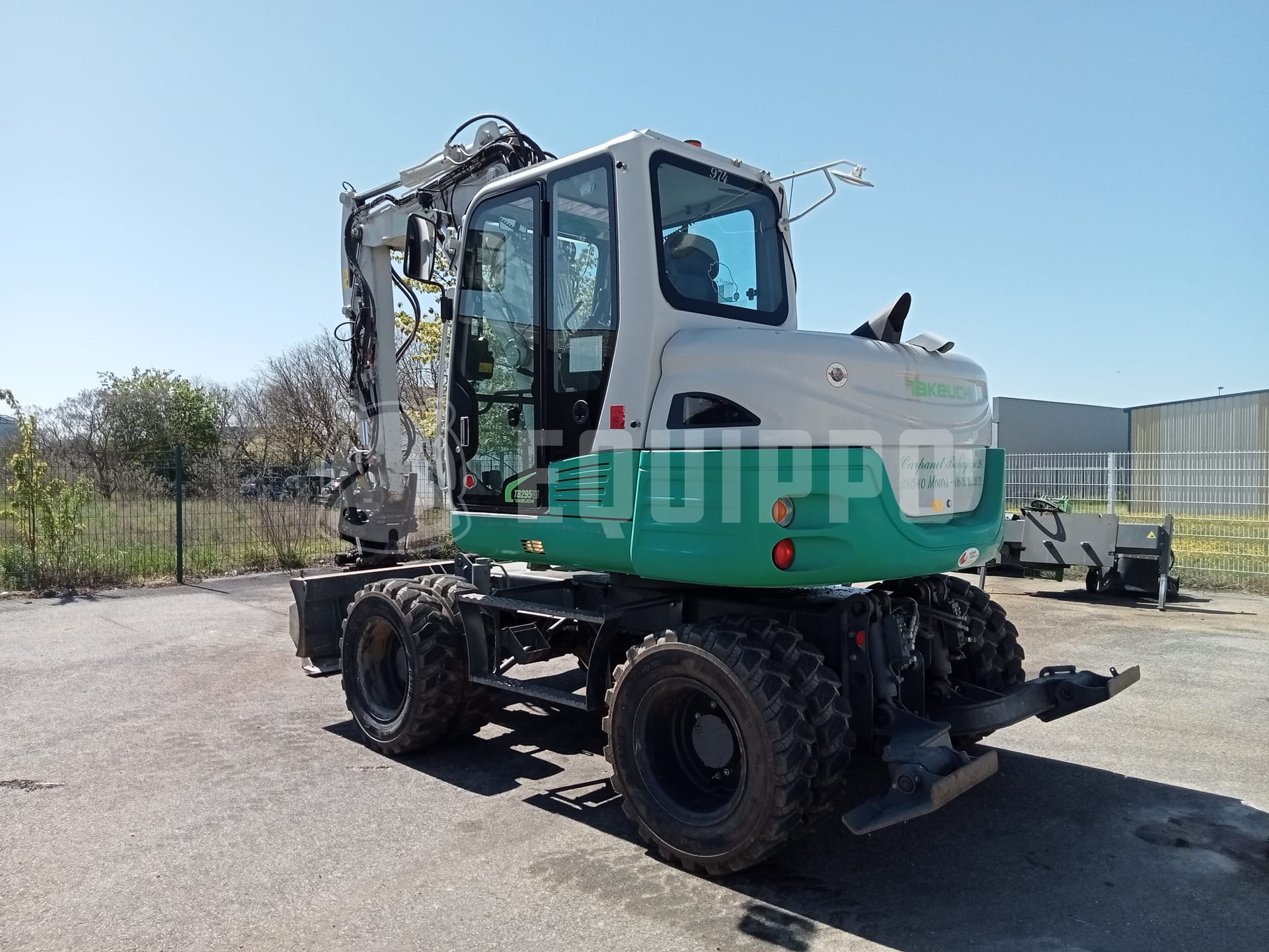 Takeuchi TB 295 W with Rototilt Oilquick, 3 buckets and forks - - Used Wheeled Excavator