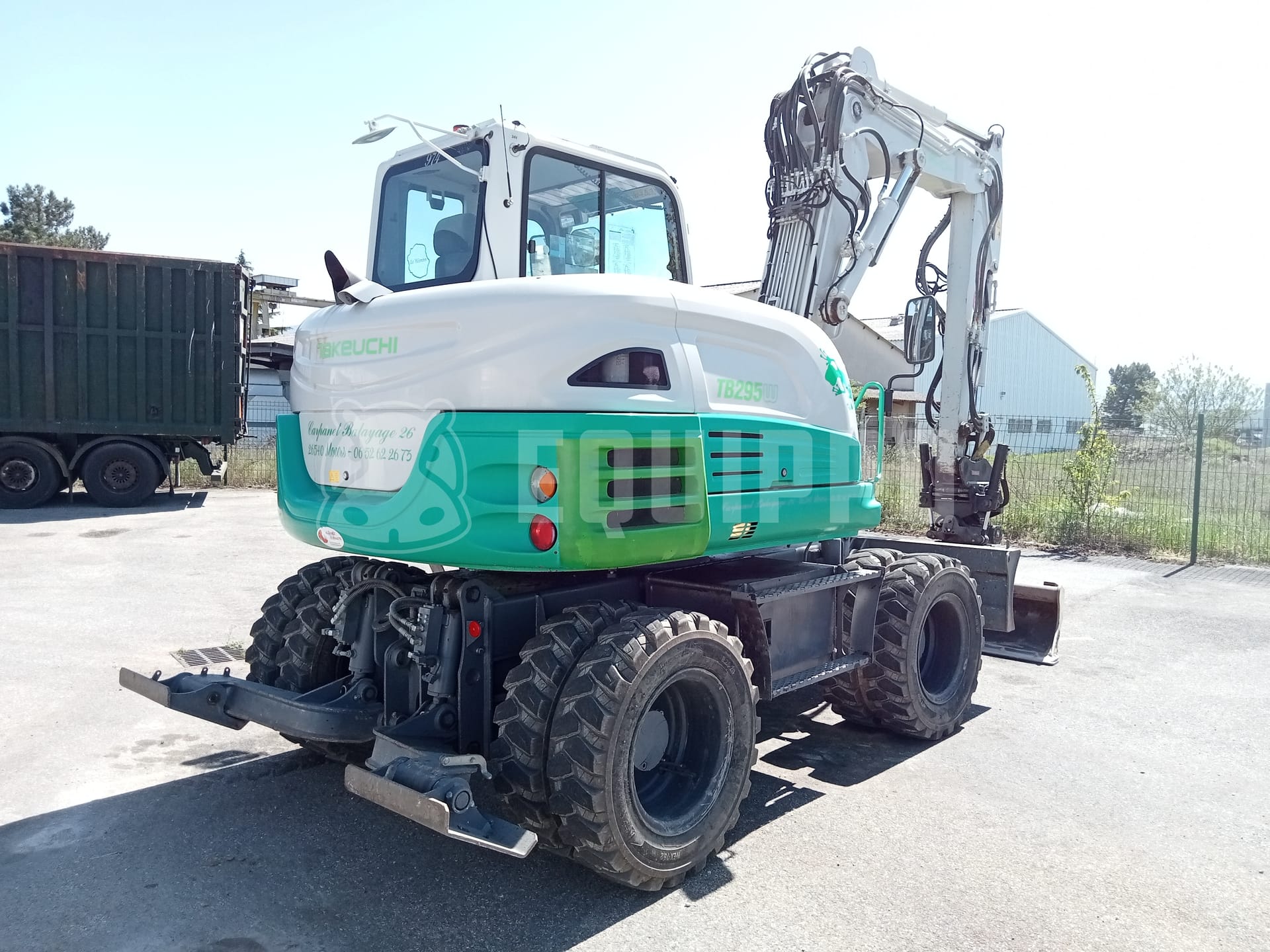 Takeuchi TB 295 W with Rototilt Oilquick, 3 buckets and forks - - Used Wheeled Excavator