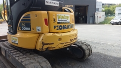Komatsu PC55MR-5E0 z 3 łyżkami - Lewa Tylna - Używany Mini koparka < 7t