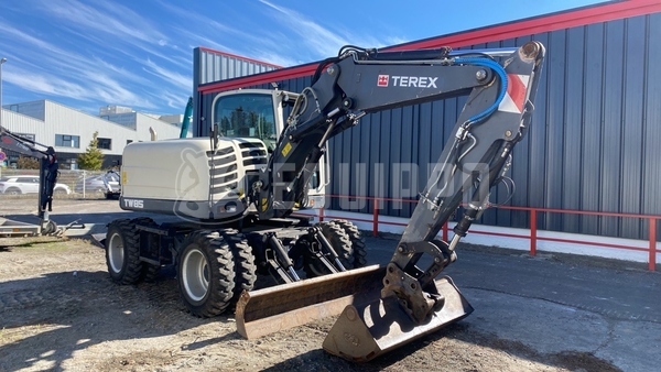 Foto van de Terex Tw 85 met 3 graafbakken en vorken