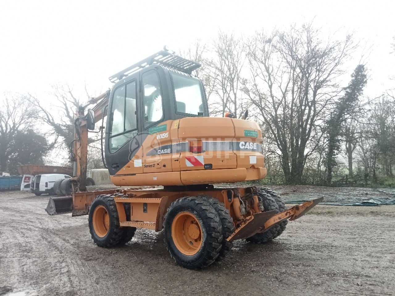 Case WX95 mit 4 Baggerlöffeln und Gabeln - - Gebrauchte  Mobilbagger