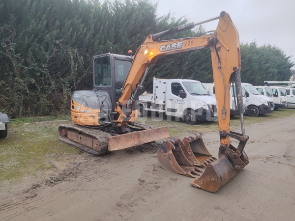 Foto van de Case CX 50 met 3 graafbakken