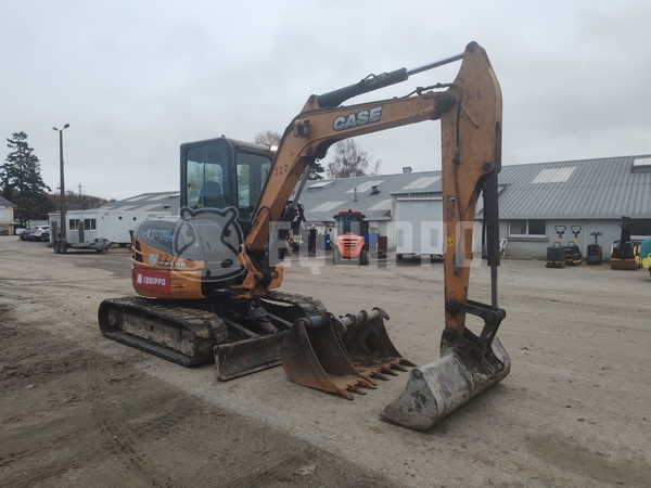 Foto van de Case CX50B met 3 graafbakken