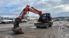 Hitachi ZX145W-6  - - Excavadora de ruedas Usada