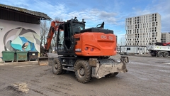 Hitachi ZX145W-6  - - Excavadora de ruedas Usada