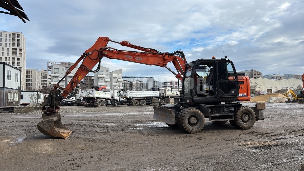 Hitachi ZX145W-6  - - Gebrauchte  Mobilbagger