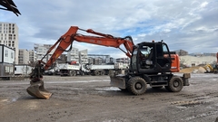 Hitachi ZX145W-6  - - Excavadora de ruedas Usada