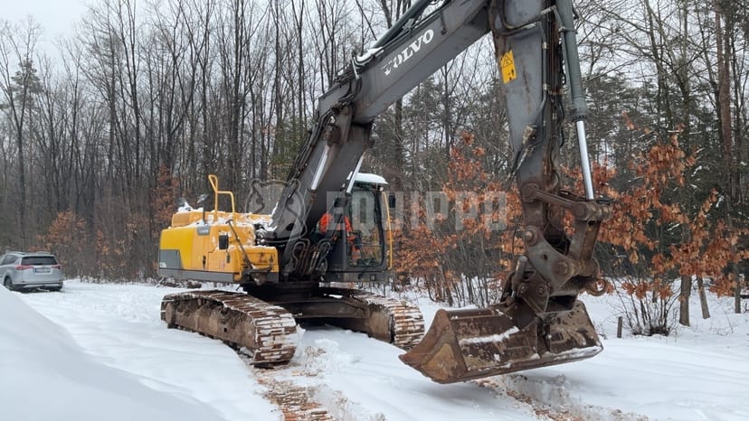 Picture of the Volvo EC250DNL with 3 excavator buckets