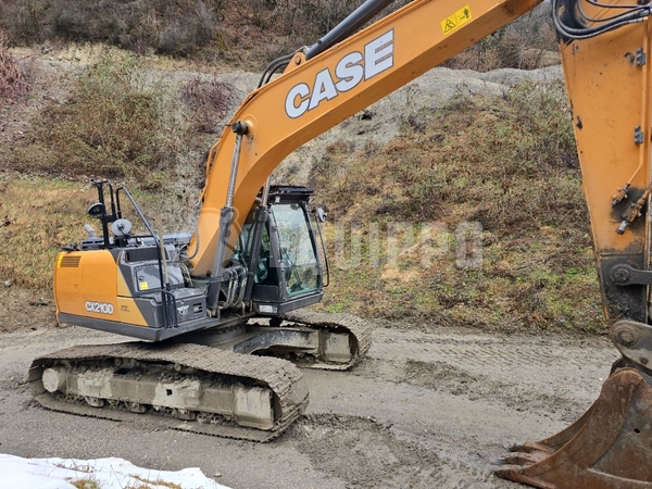 Picture of the Case CX210D with 2 excavator buckets