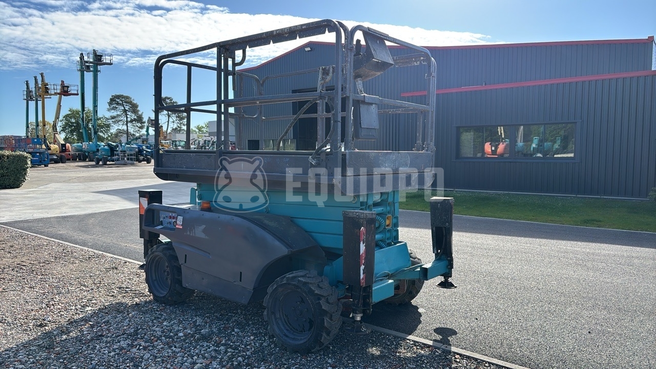 Haulotte Compact 12 Dx (12m) - - Używany Podnośnik nożycowy