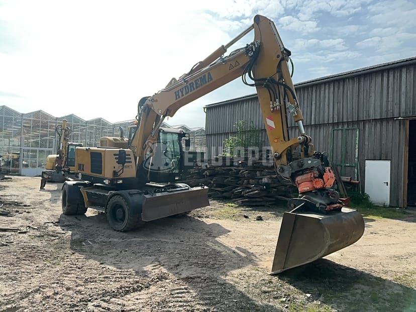 Imagen del Hydrema RB15-MX18 con tiltrotator, acoplamiento rápido y cazo de excavadora