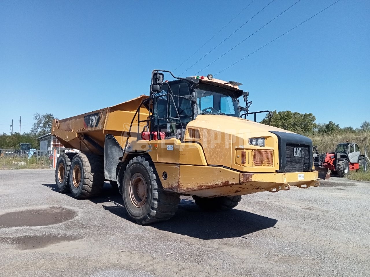 Caterpillar 730 - - Dúmper Usada